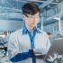 hightech-factory-asian-engineer-uses-laptop-computer-programing-pick-place-electronic-machinery-printed-circuit-board-surface-mount-assembly-line-production-pcb-with-smt-machinery